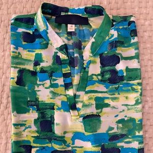 Short sleeve medium green and white top.